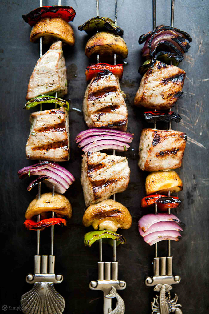 BBQ Meat Ideas for Large Groups: Overhead view of Grilled Tuna Kebabs on a dark background.